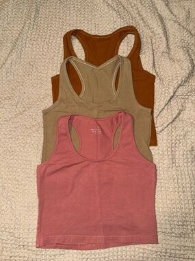 Three cotton cropped racerback tanks